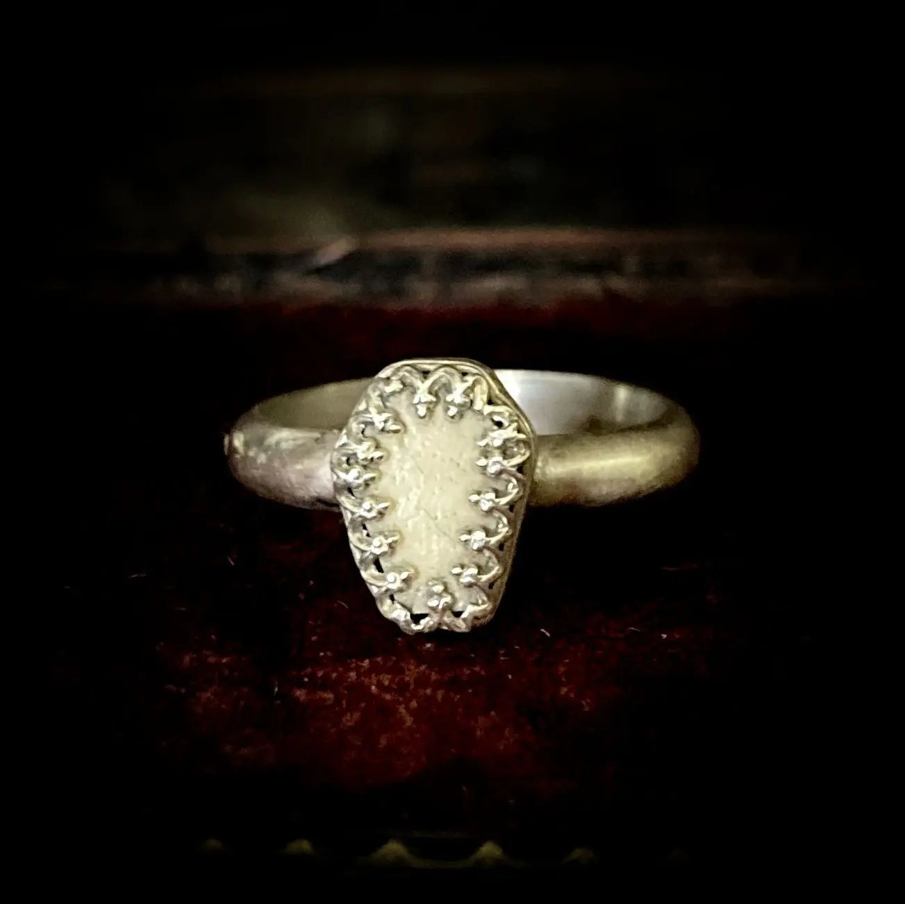 Human bone and sterling silver coffin ring